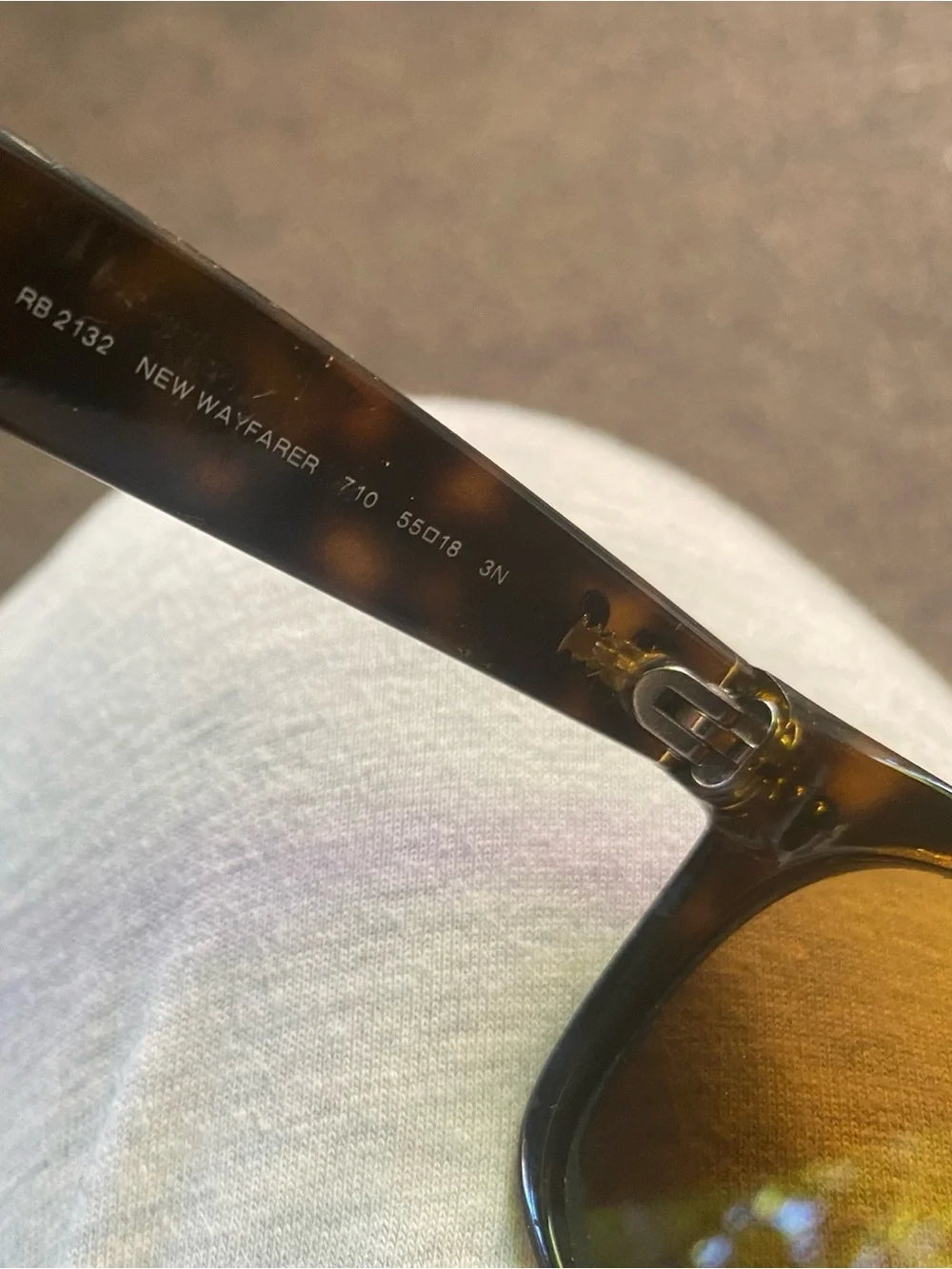 Ray-Ban Black Frame Sunglasses with Brown Lenses